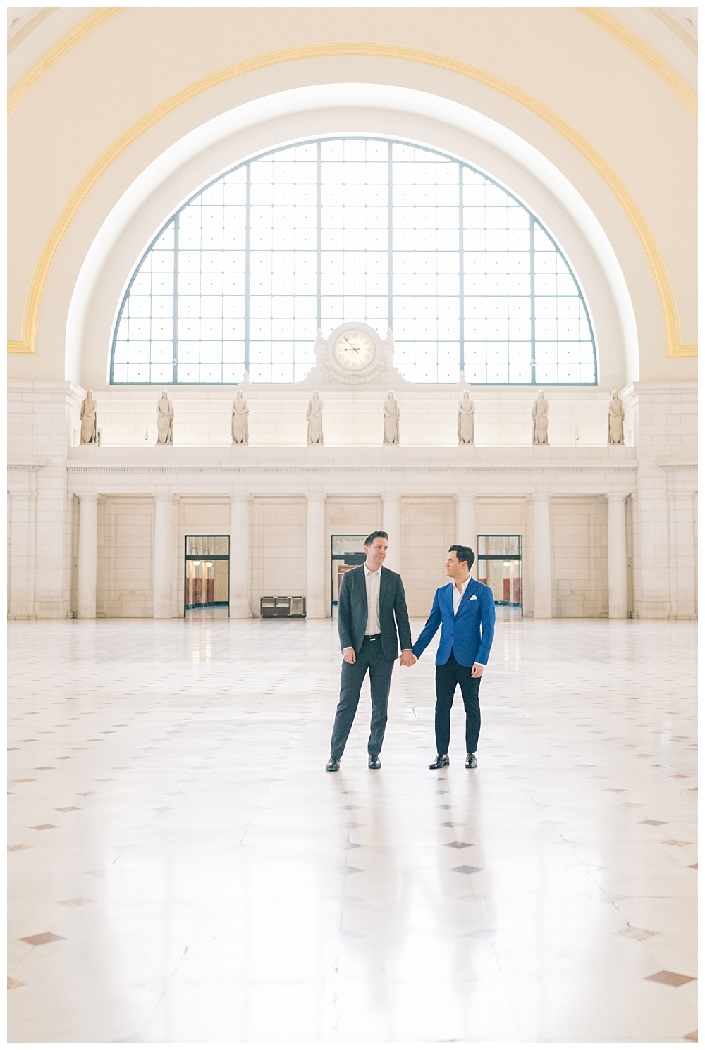 washington-dc-wedding-photographer engaged couple holding hands in union station