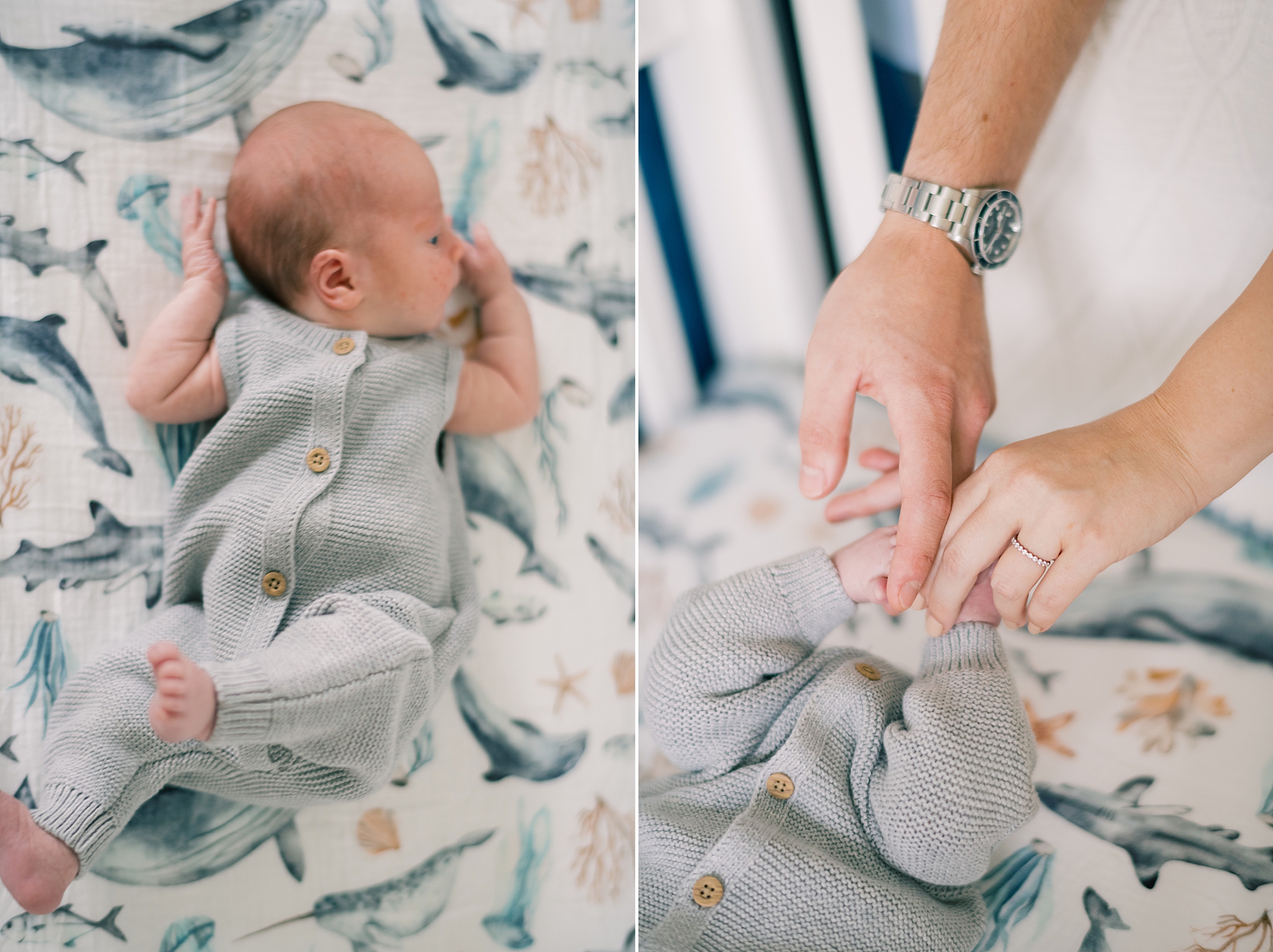 baby in grey knit outfit lays on bed with nautical sheets 