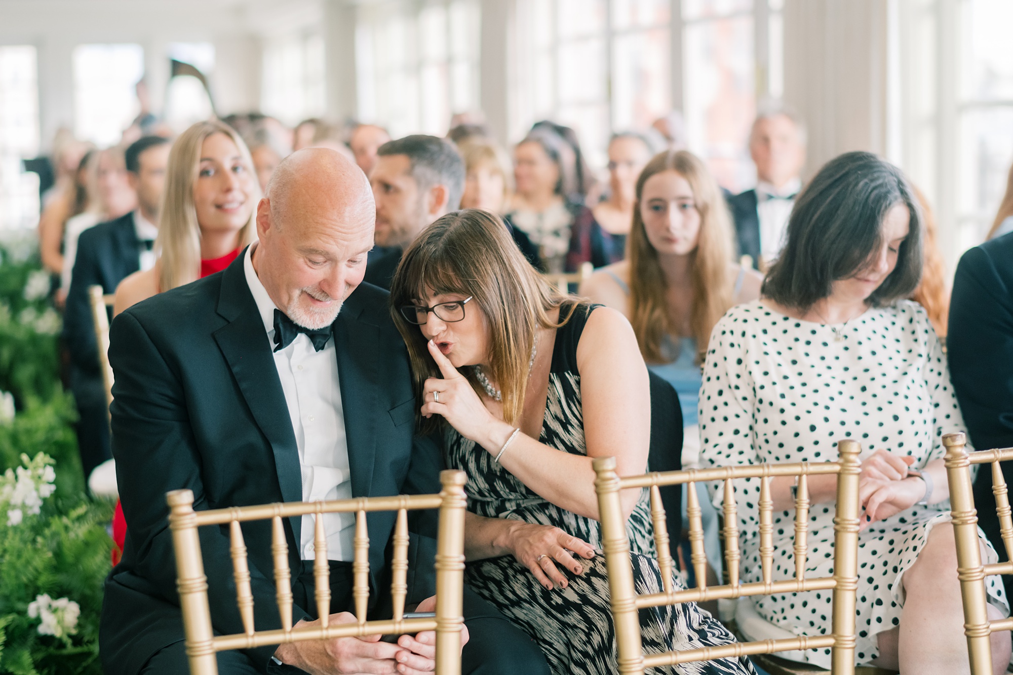 guests wait for wedding ceremony inside the Hay Adams Hotel