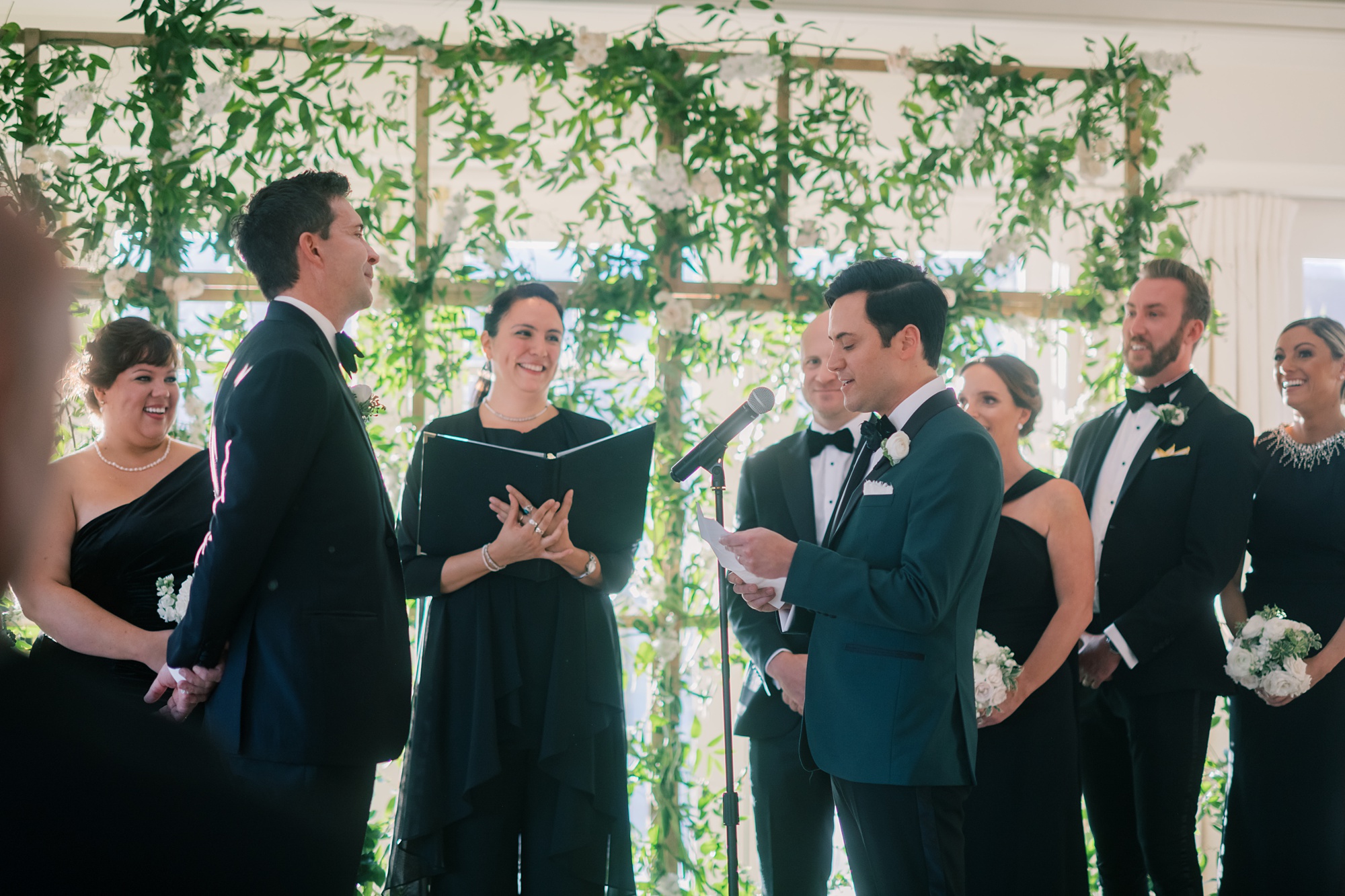 grooms exchange vows during ceremony inside the Hay Adams Hotel