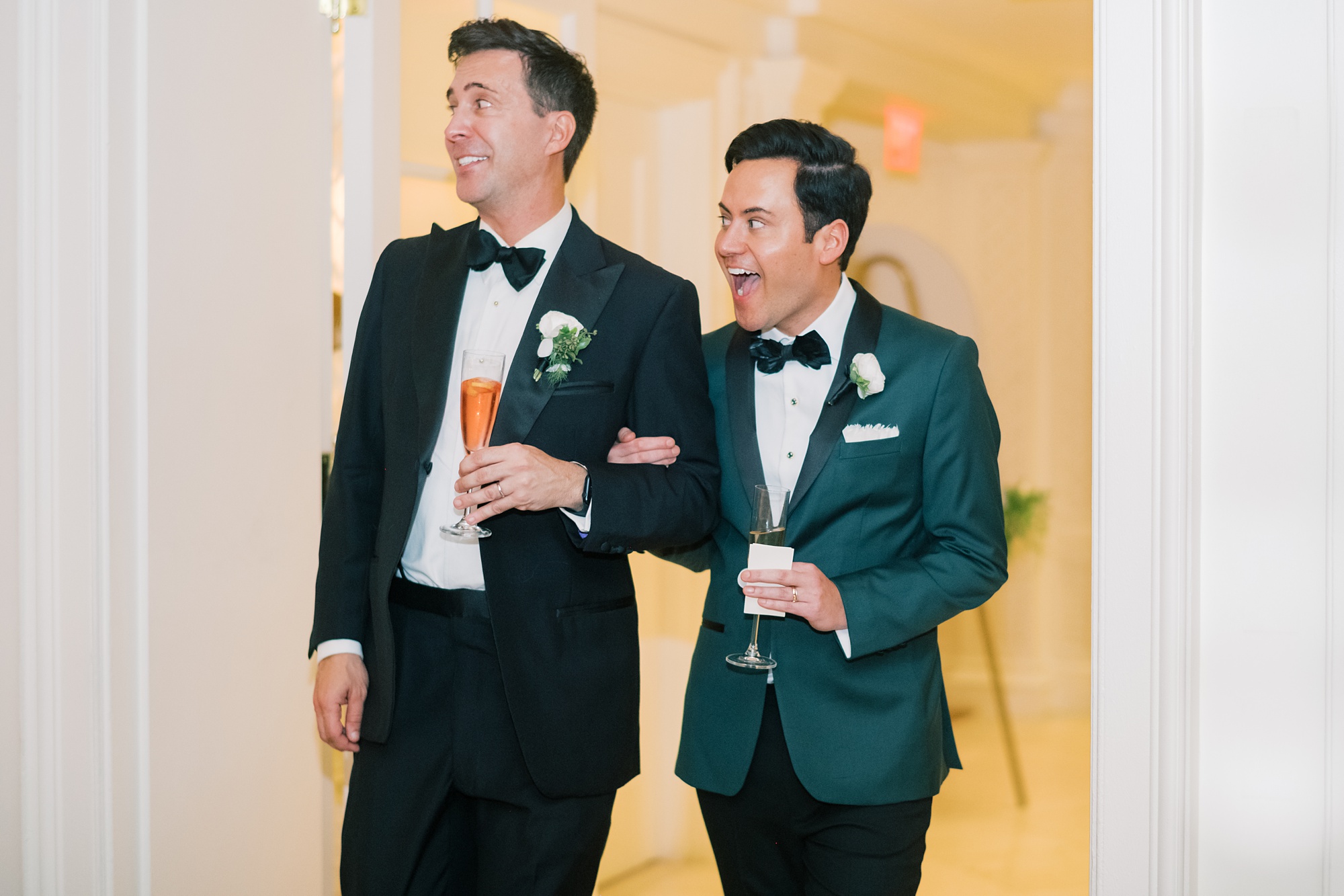 groomsmen smile looking at reception space in the Hay Adams Hotel