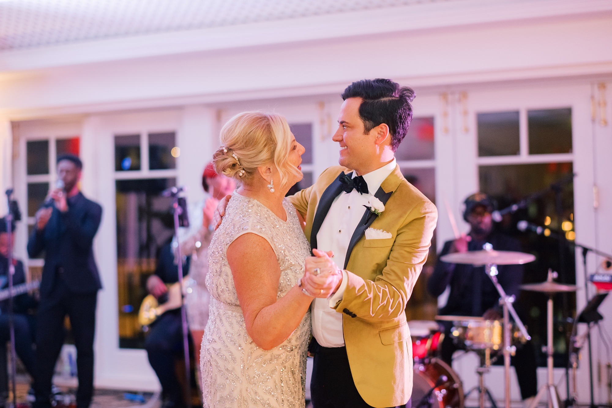 groom dances with mother during reception at the Hay Adams Hotel