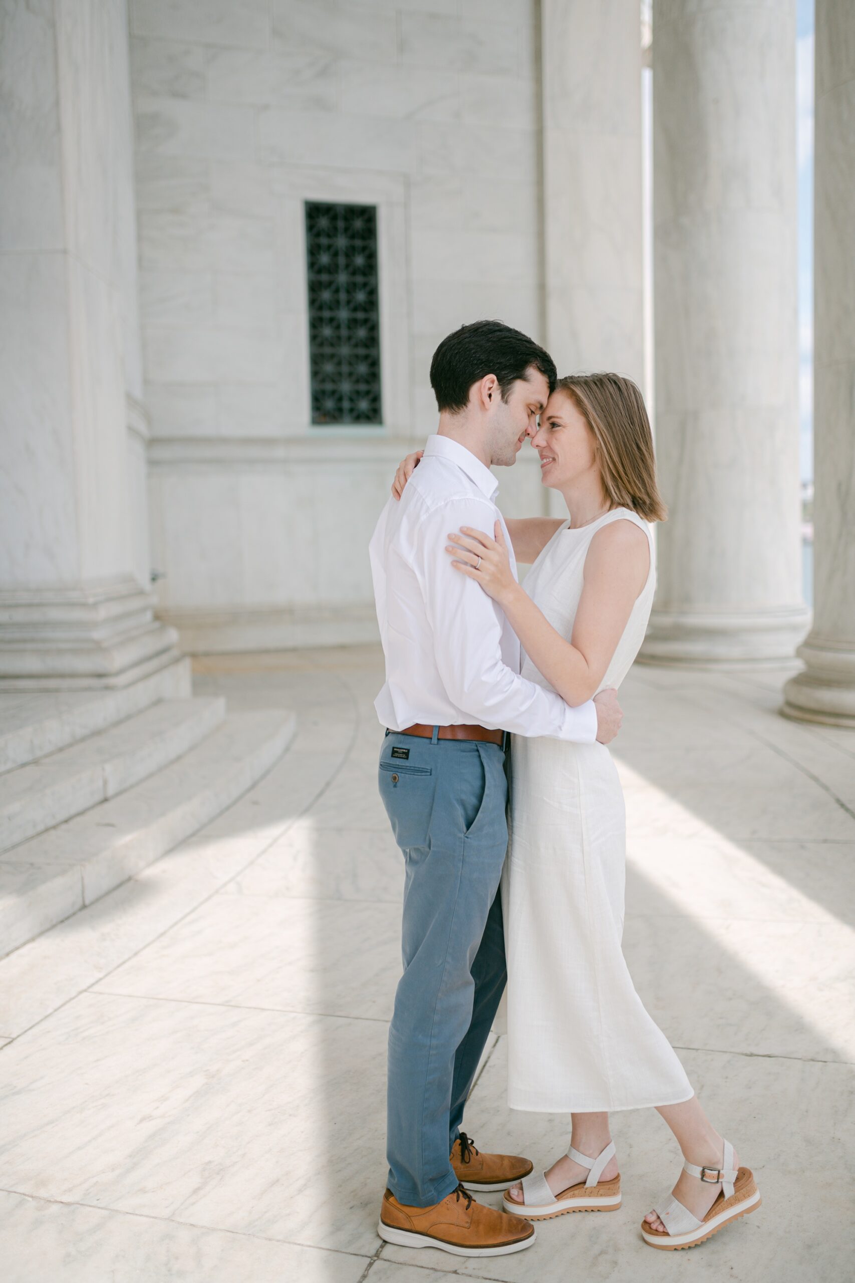 engaged couple leans heads together during DC engagement session