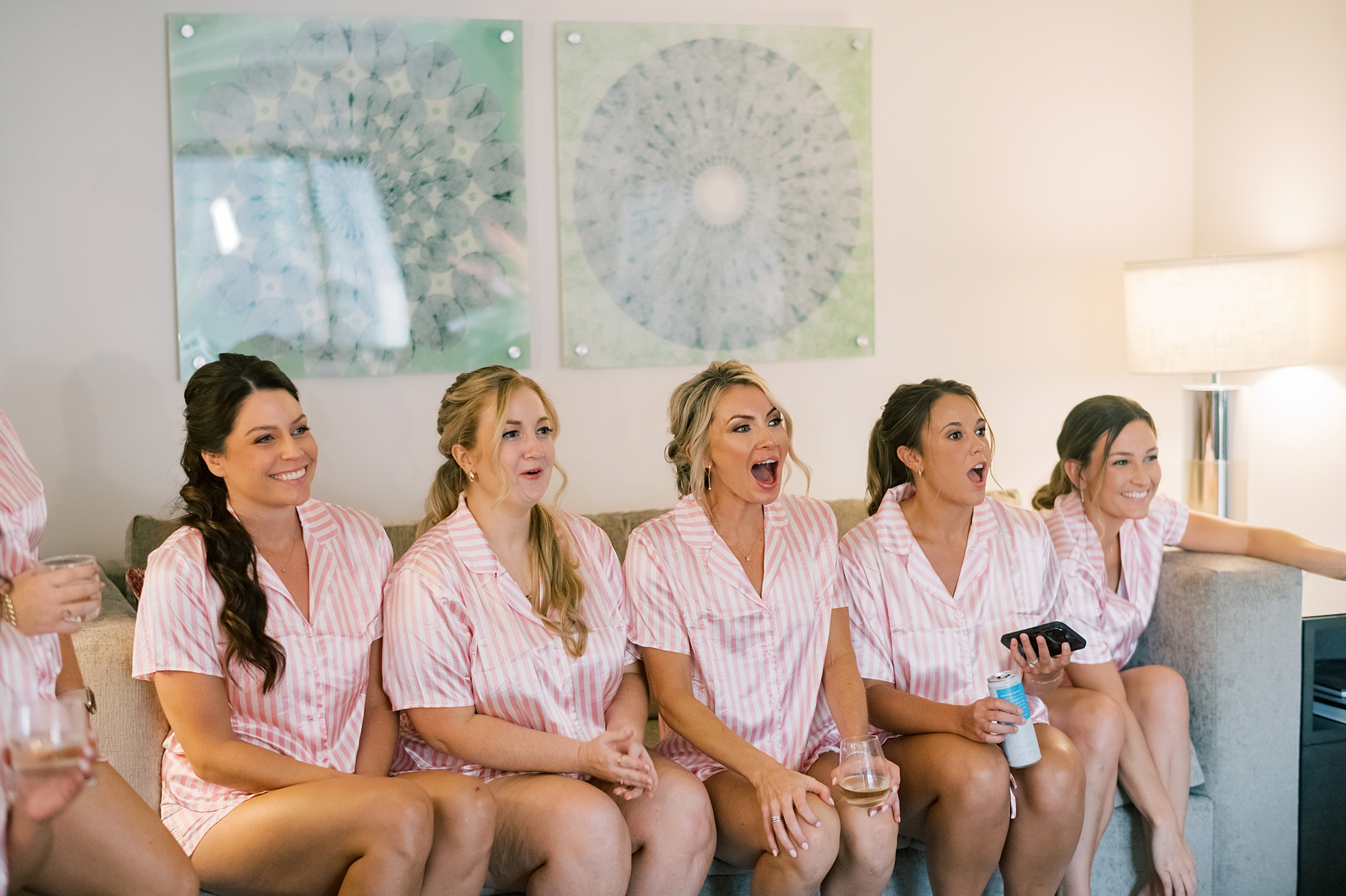 bridesmaids react to seeing bride's gown 