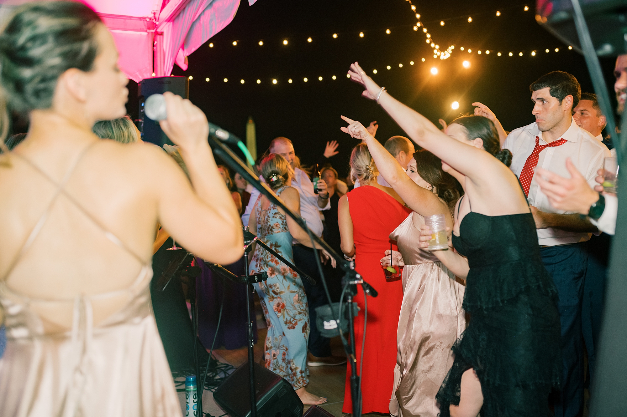 guests dance with live band during DC wedding reception