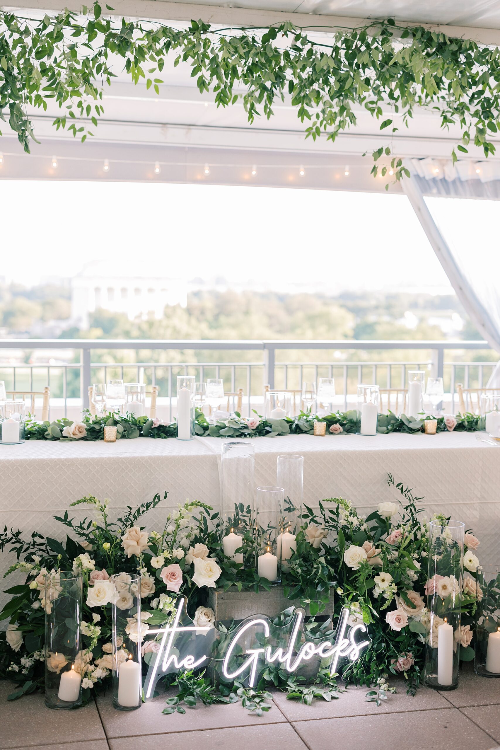 sweetheart table with greenery wrapped on top for Potomac View Terrace wedding