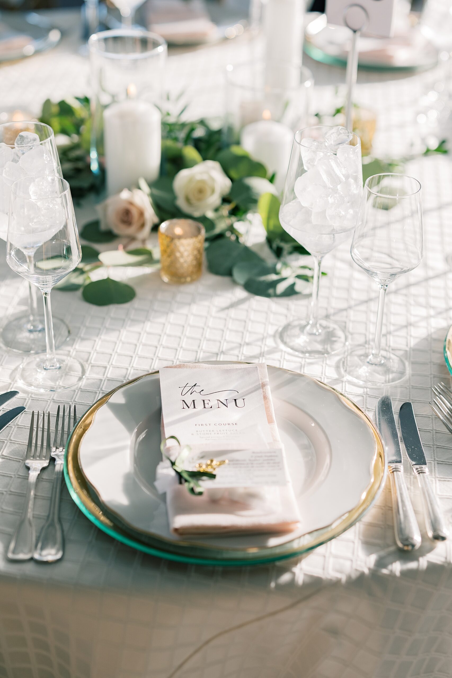 place setting with ivory and gold wedding reception at Potomac View Terrace