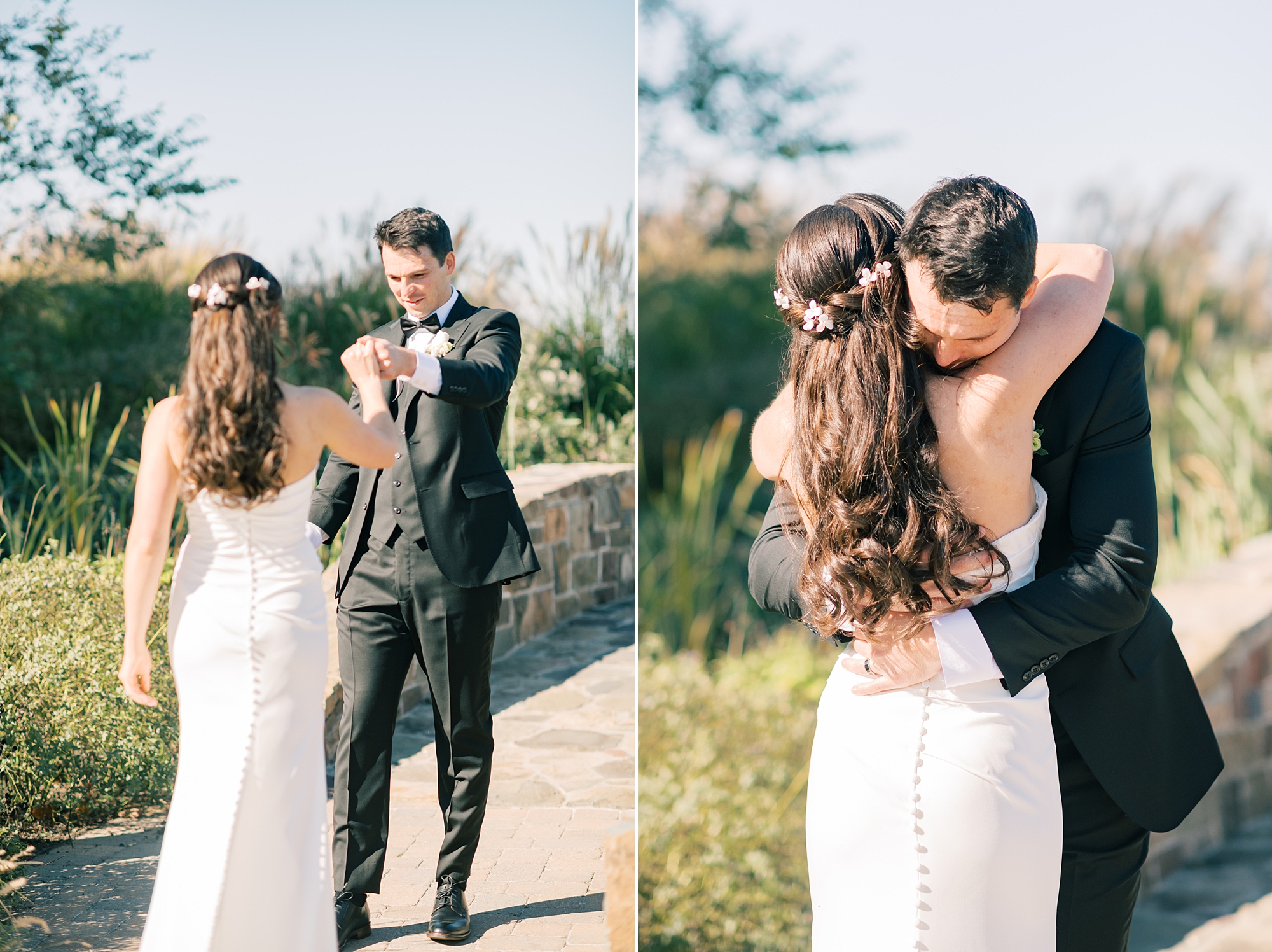 groom hugs bride during first look in gardens at Herrington on the Bay