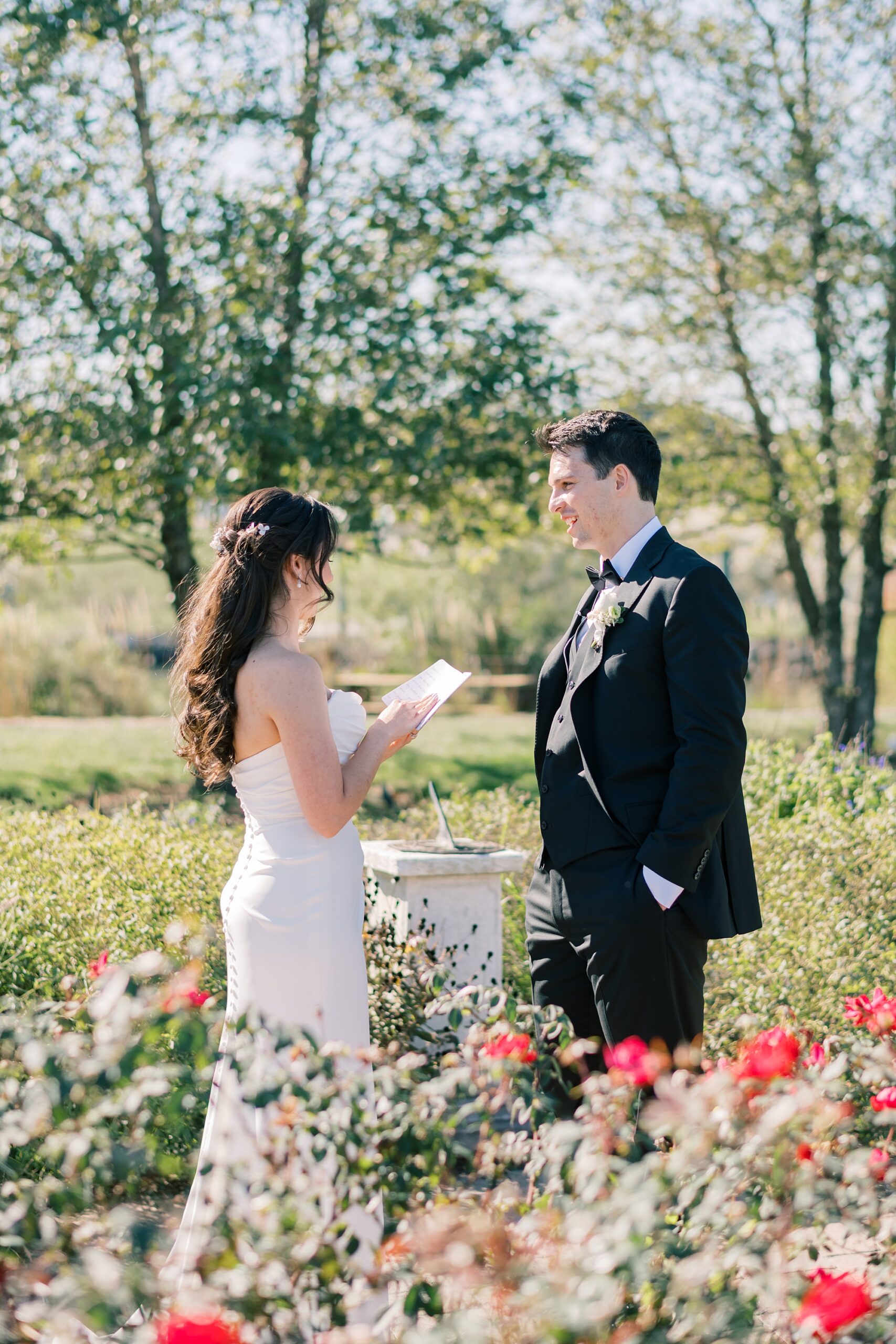 bride and groom exchange private vows in the gardens at Herrington on the Bay