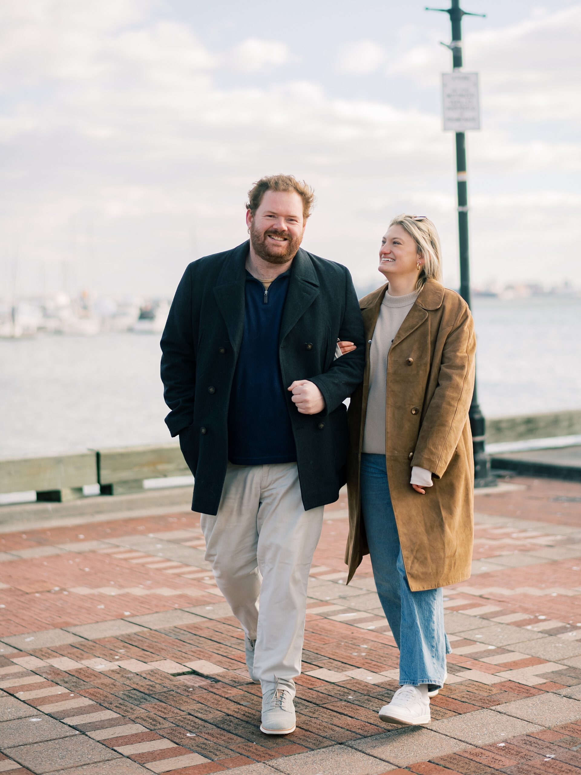 couple walks on pathway in Baltimore MD