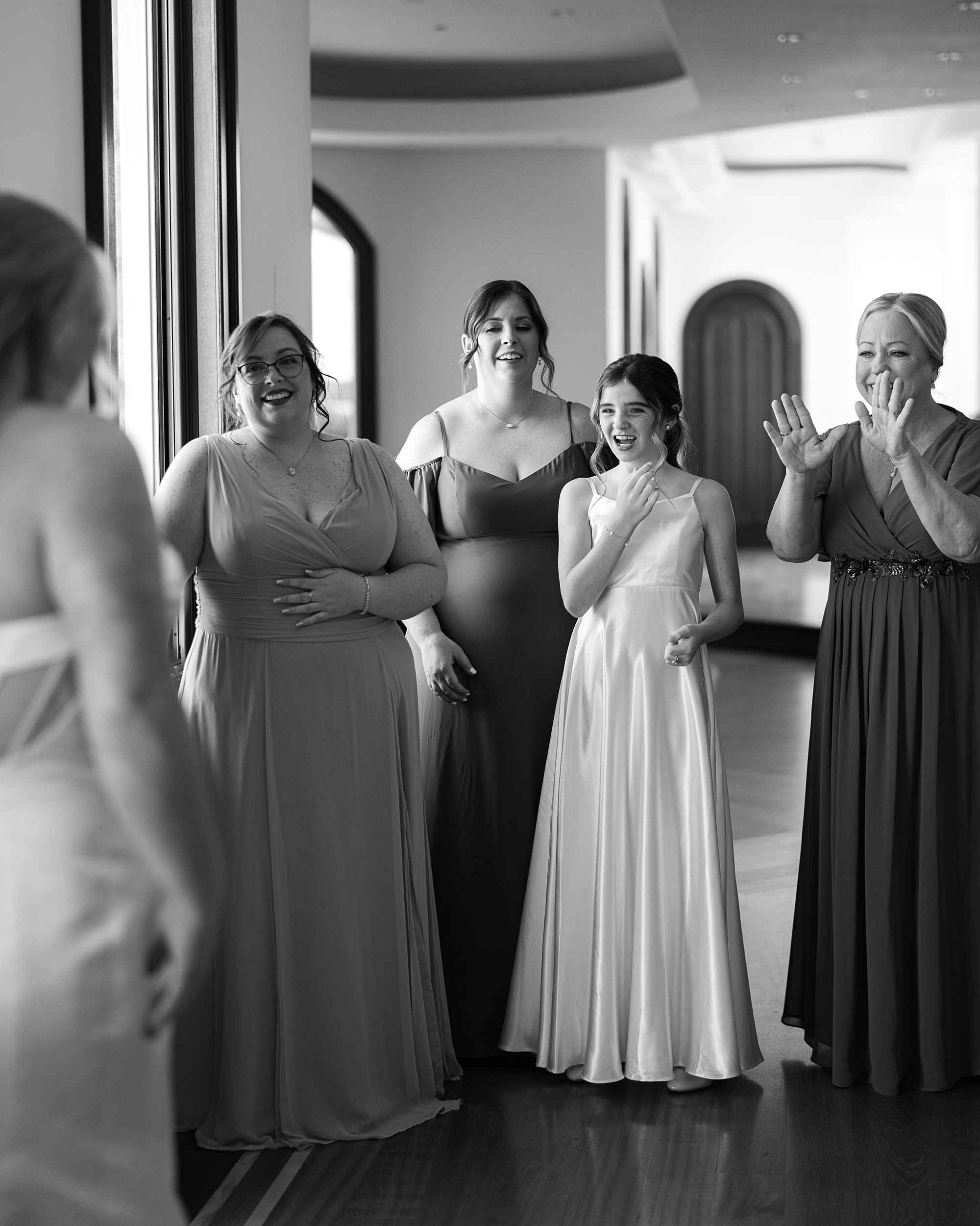 bridesmaids react to seeing bride during first look