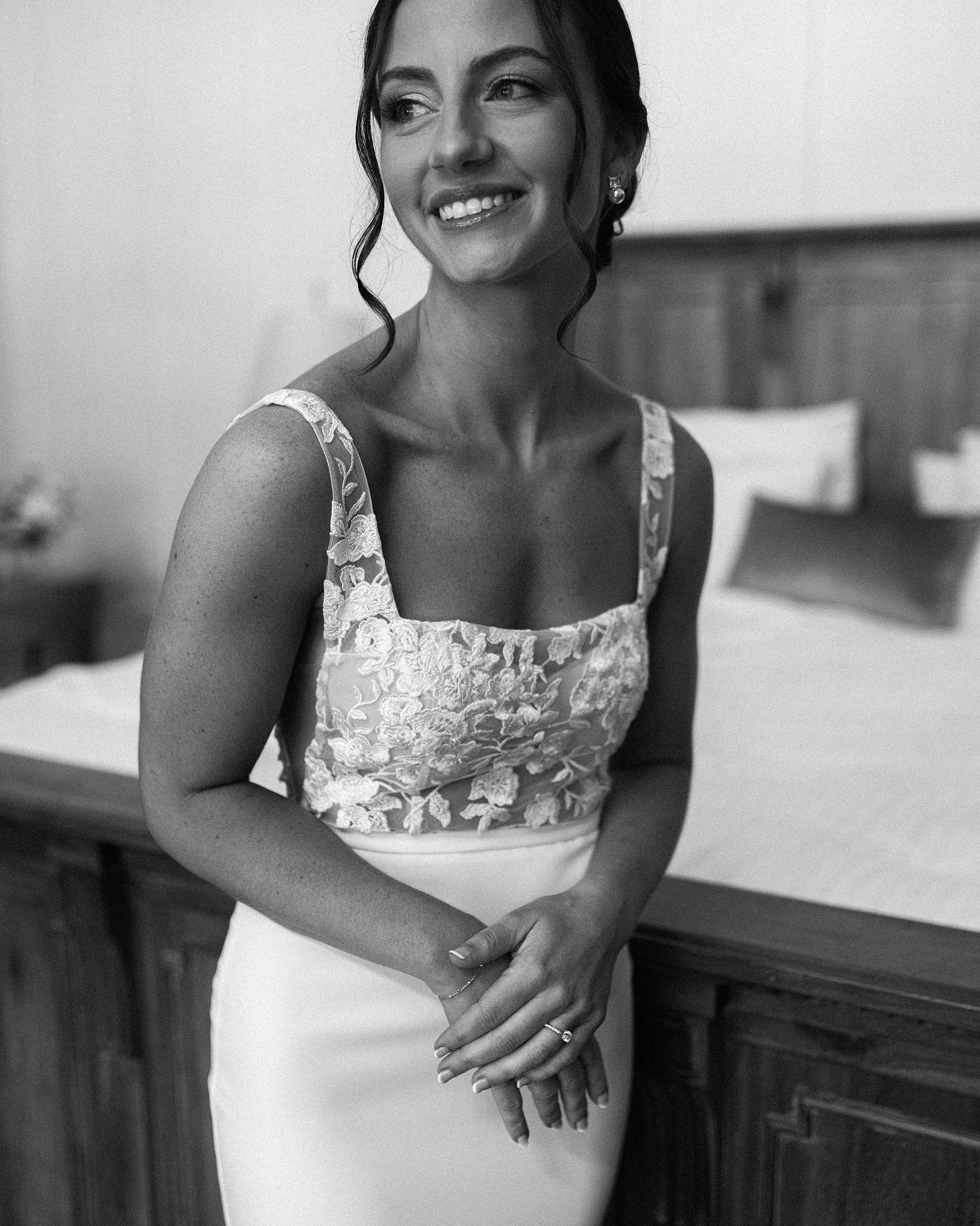 bride smiles in wedding dress at Chesapeake Bay Beach Club