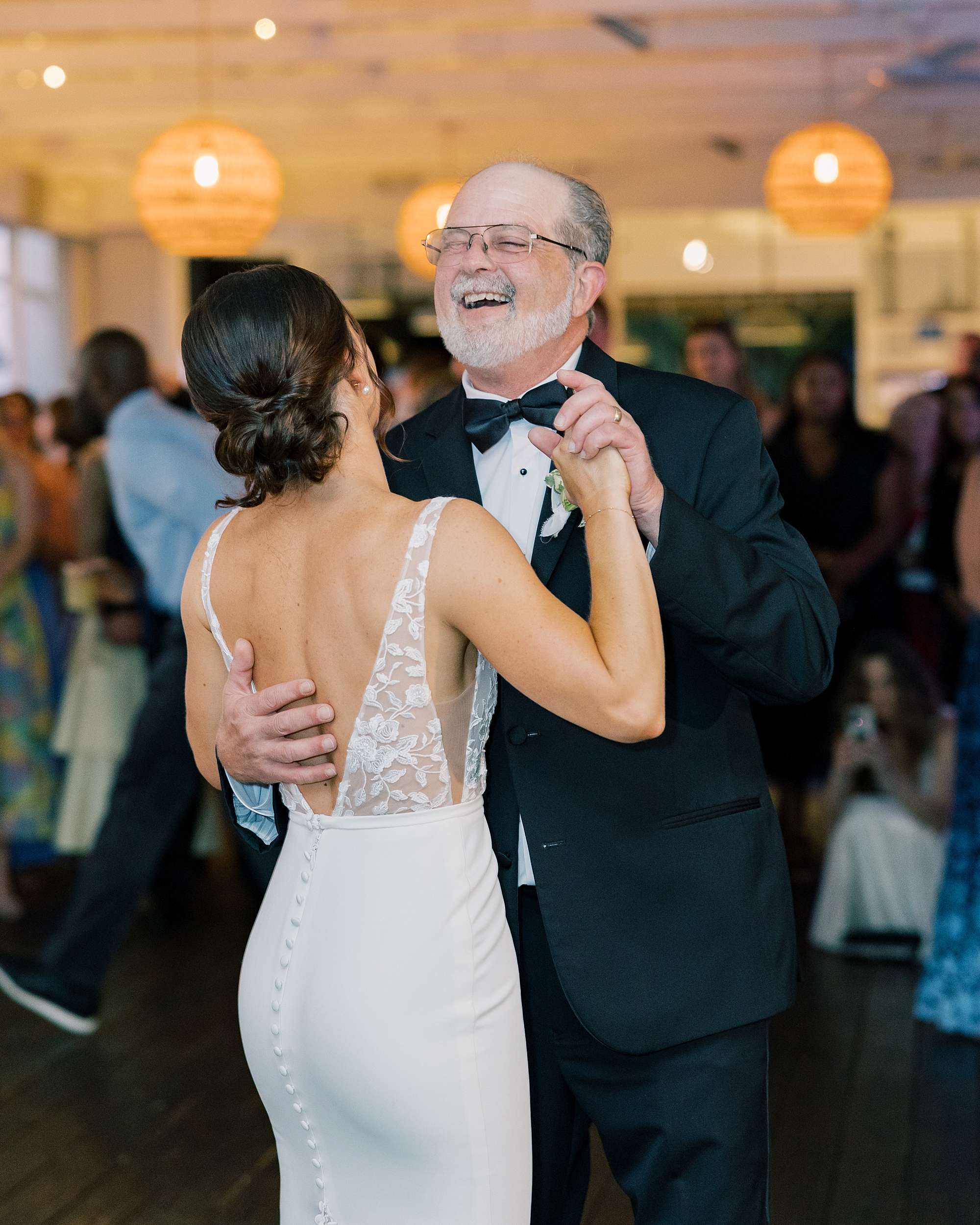 bride dances with father during wedding reception at Chesapeake Bay Beach Club