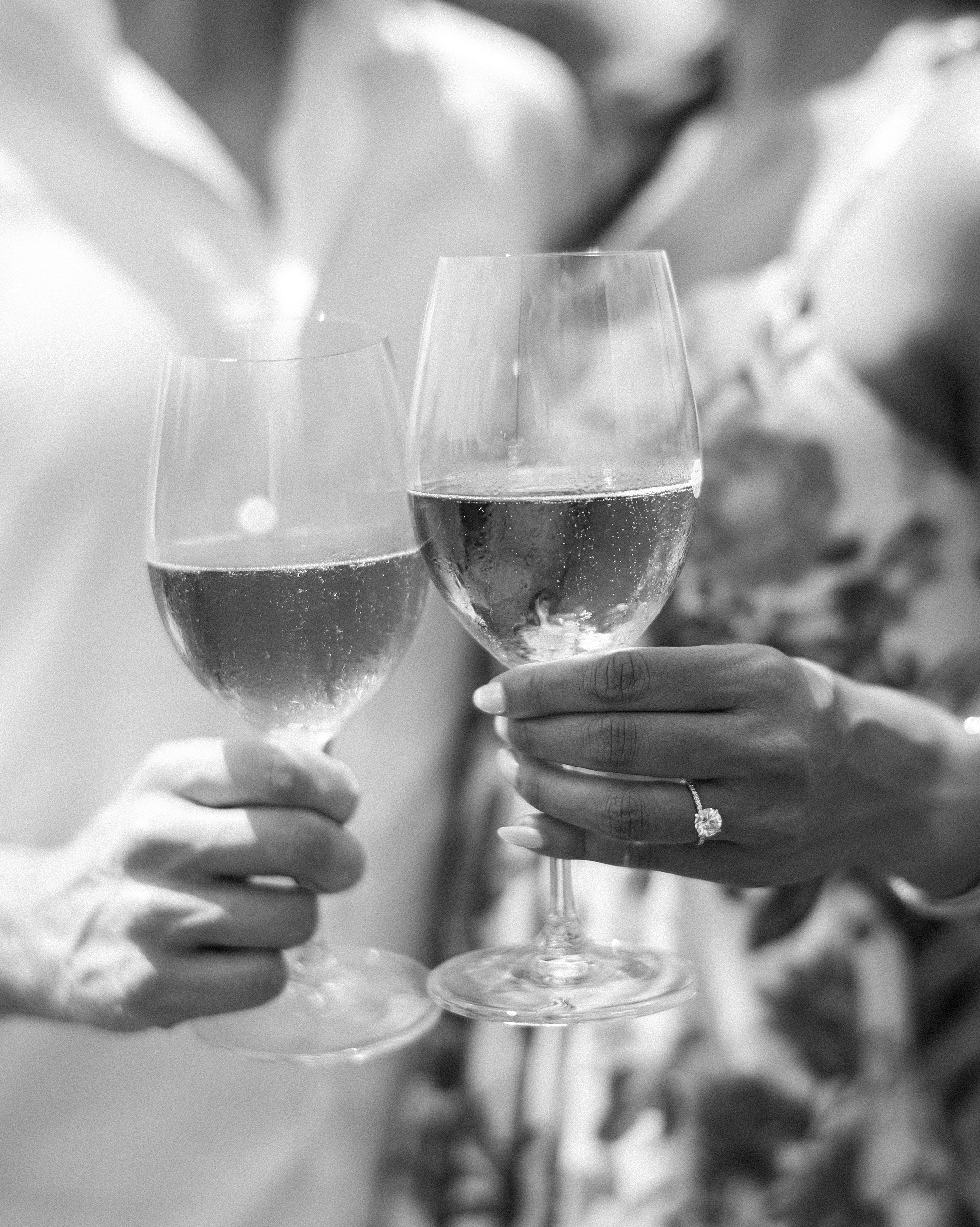 couple toasts glasses of wine at Stone Tower Winery