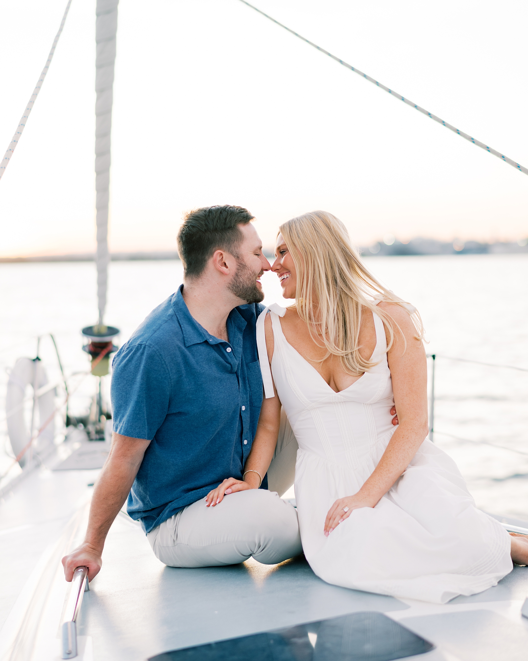 Romantic engagement session on sailboat in Baltimore 