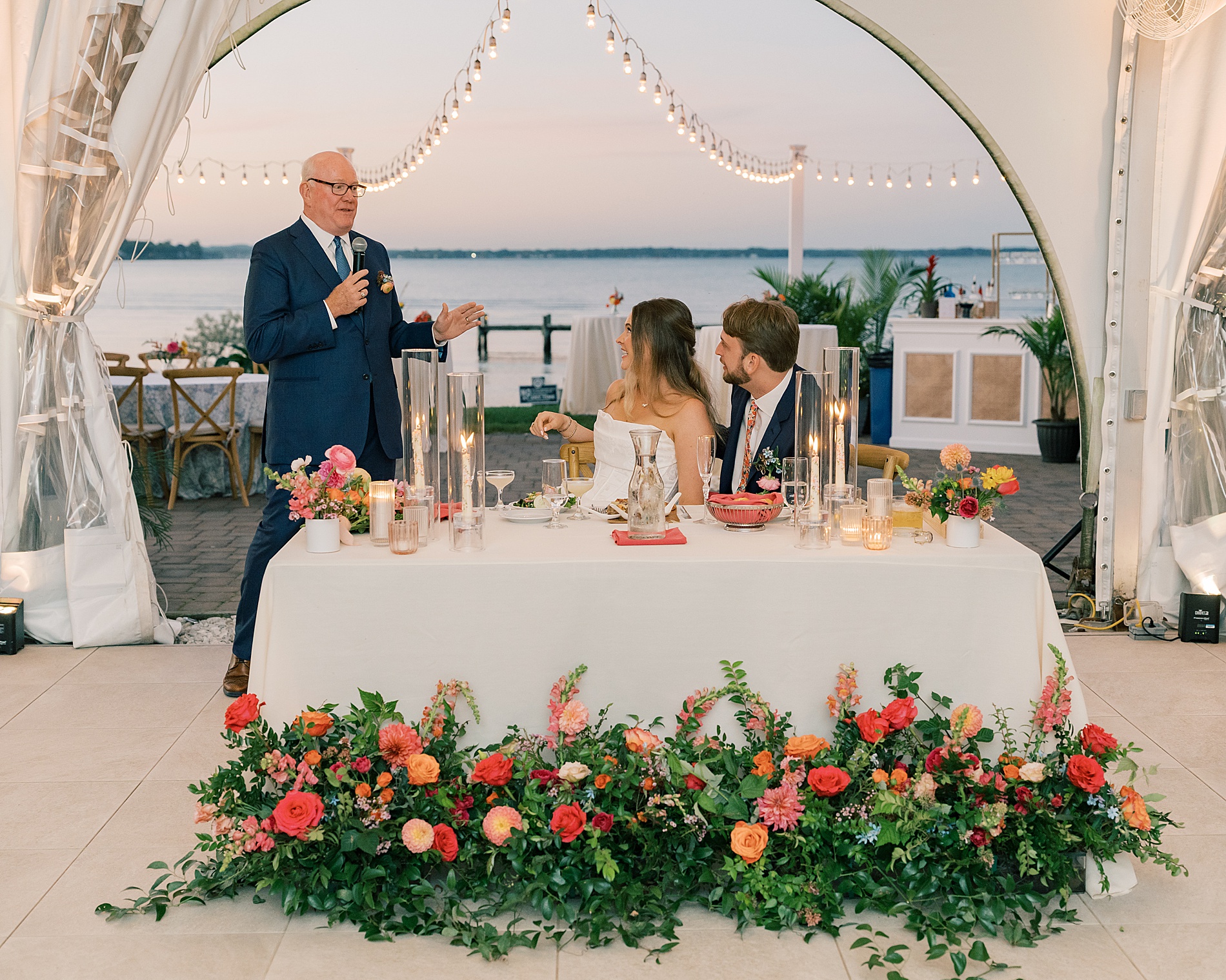 father gives speech at reception 