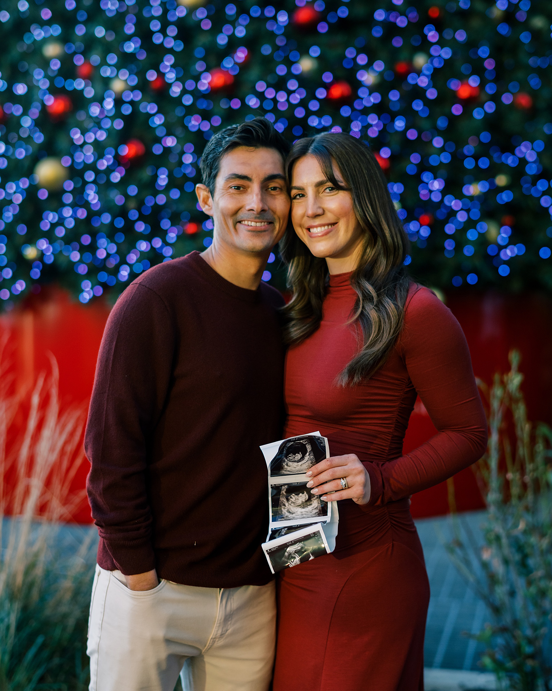 Festive maternity portraits at Inner Harbor in Baltimore, MD