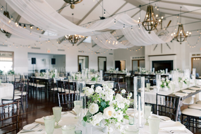 white flowers and drapery inside the reception room at Chesapeake bay beach club 