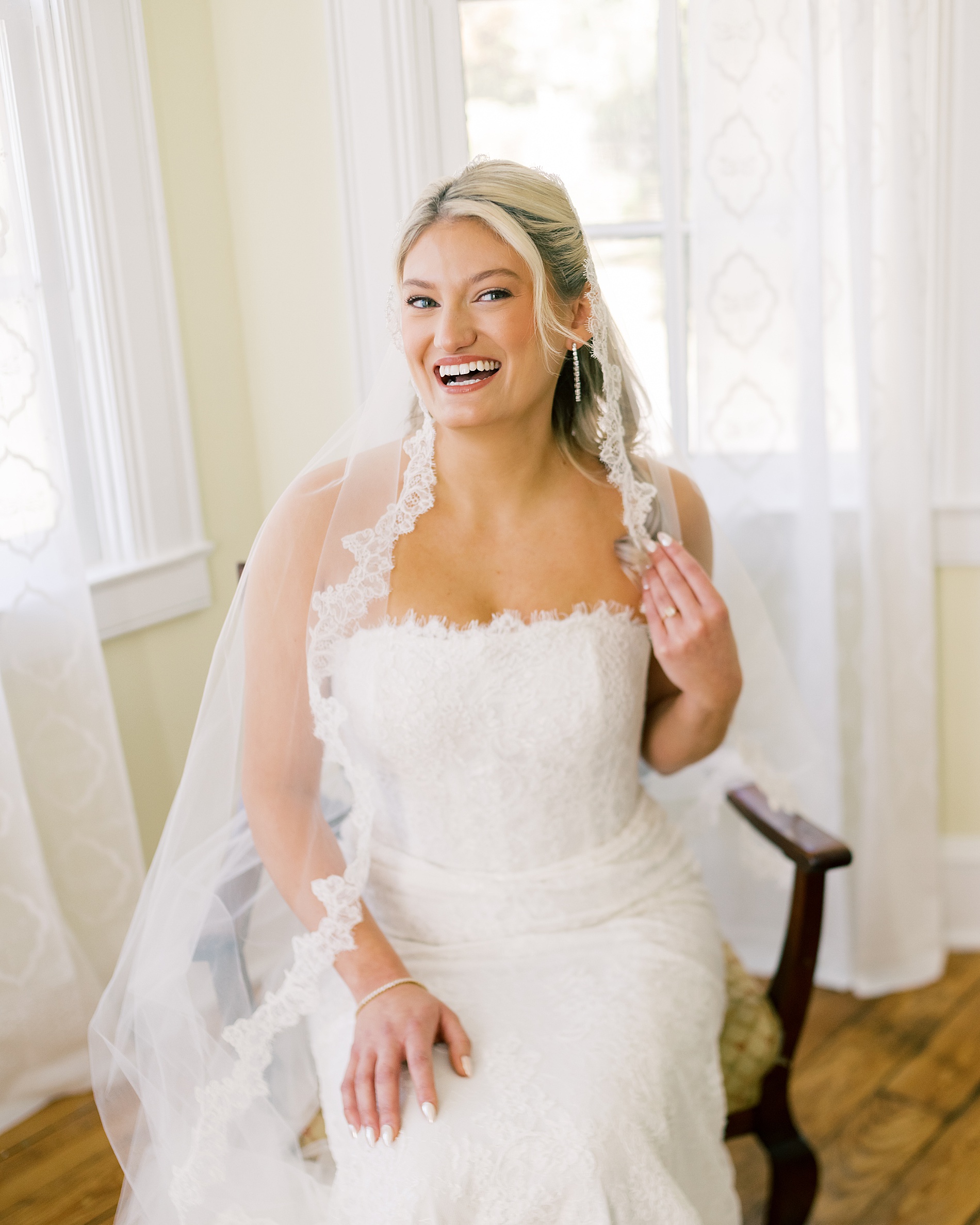 bride in wedding dress with veil 