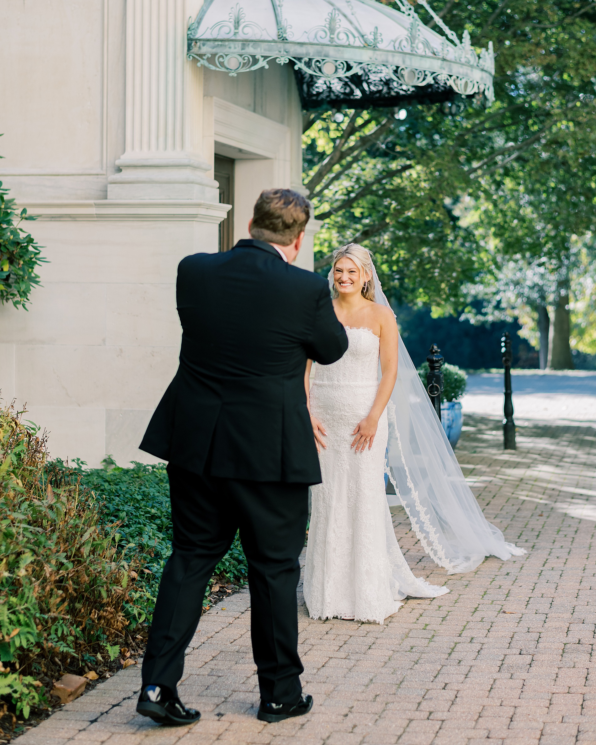 candid first look between bride and groom