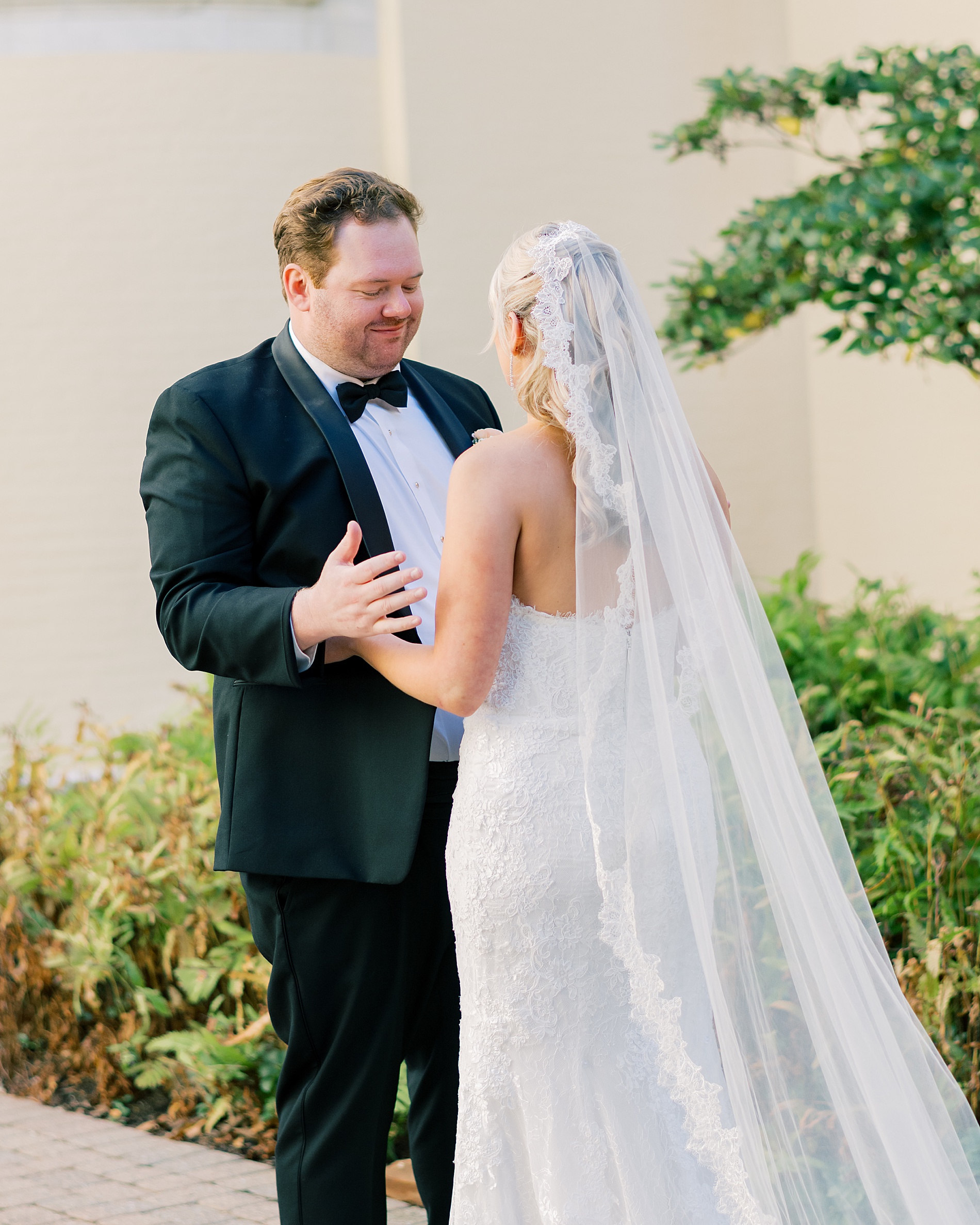 candid first look moments from Classic Wedding at the Evergreen Library in Baltimore, MD
