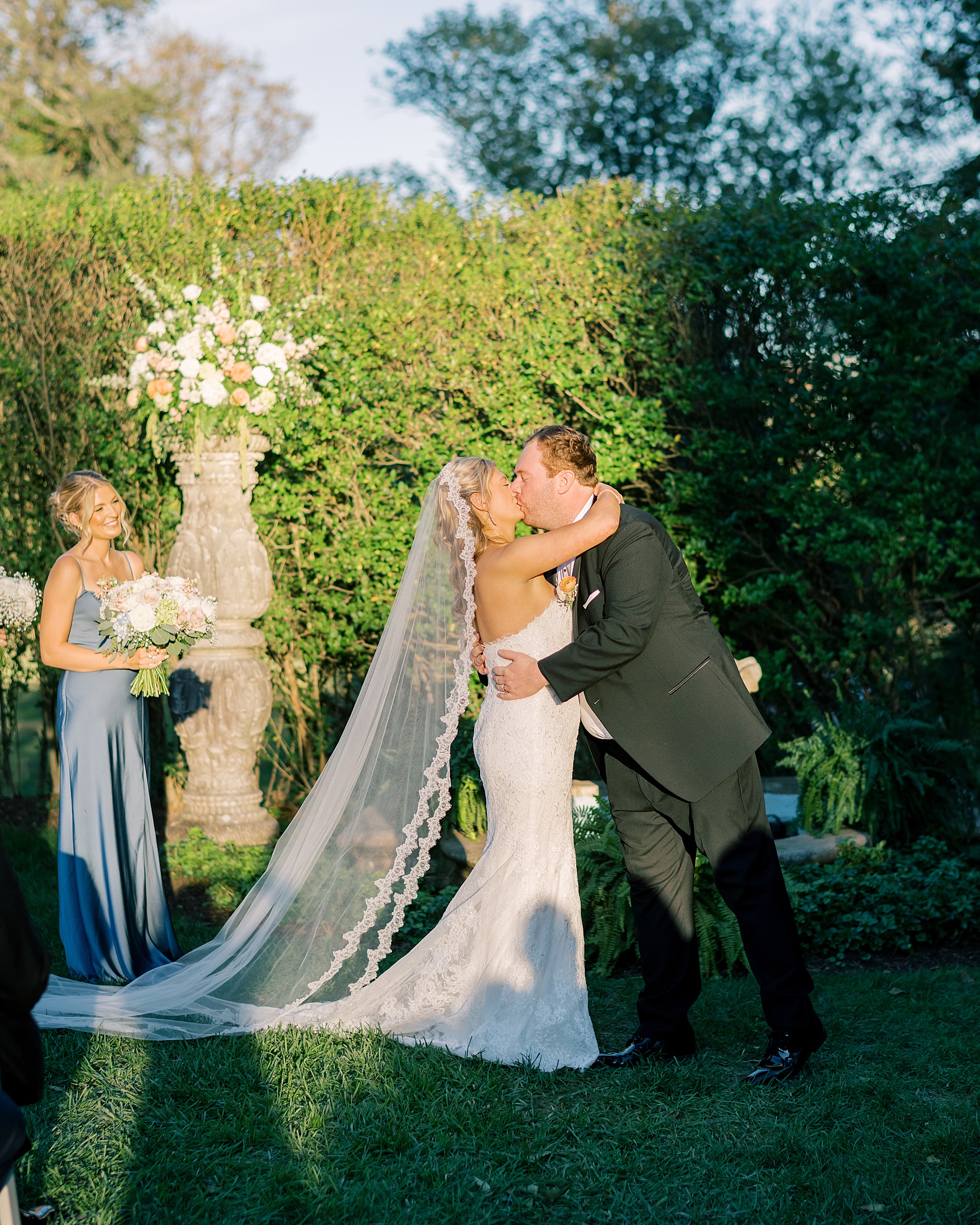Newlyweds kiss at wedding ceremony 