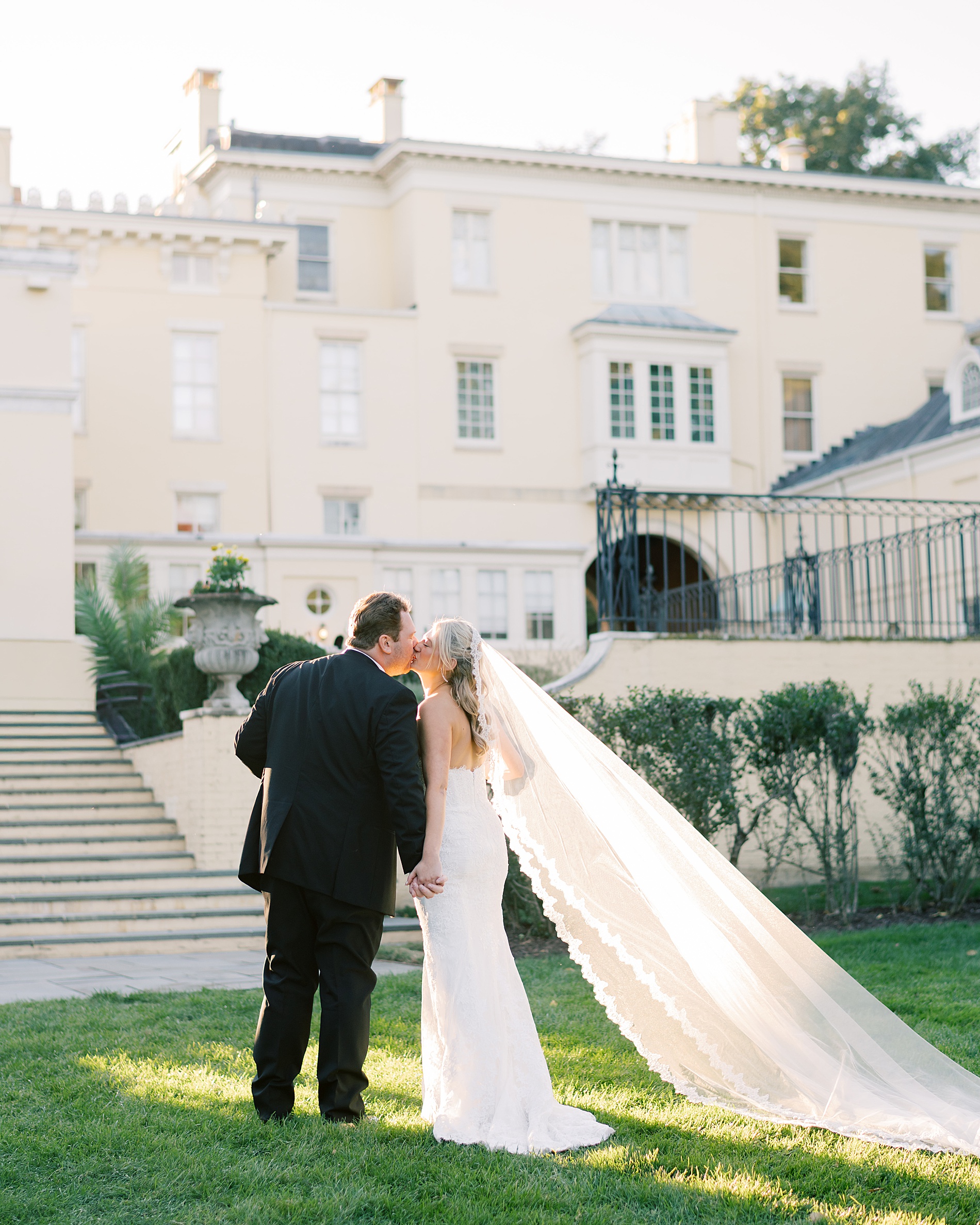 Newlyweds kiss at Classic Wedding at the Evergreen Library in Baltimore, MD
