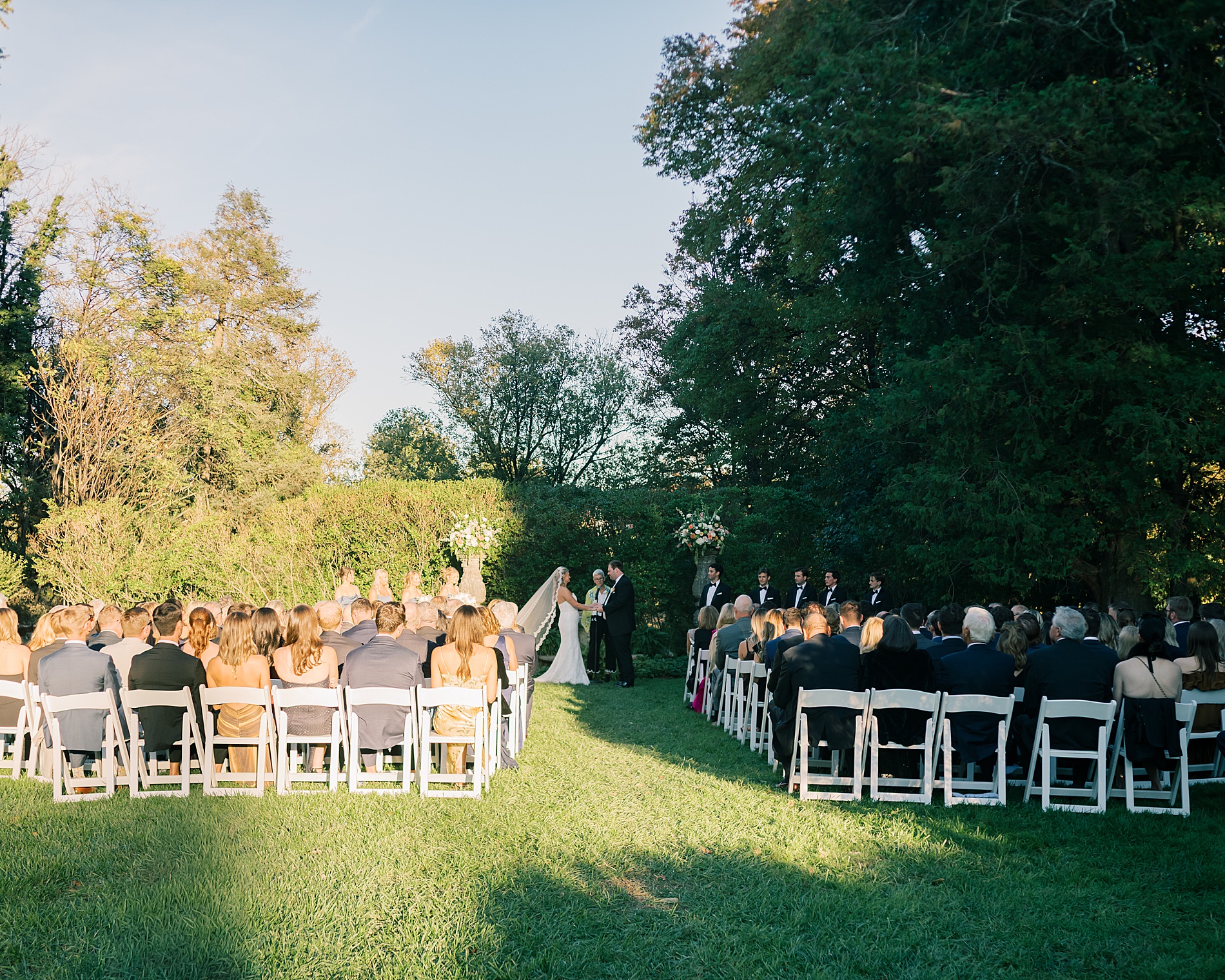 outdoor garden wedding ceremony at the Evergreen Library in Baltimore, MD