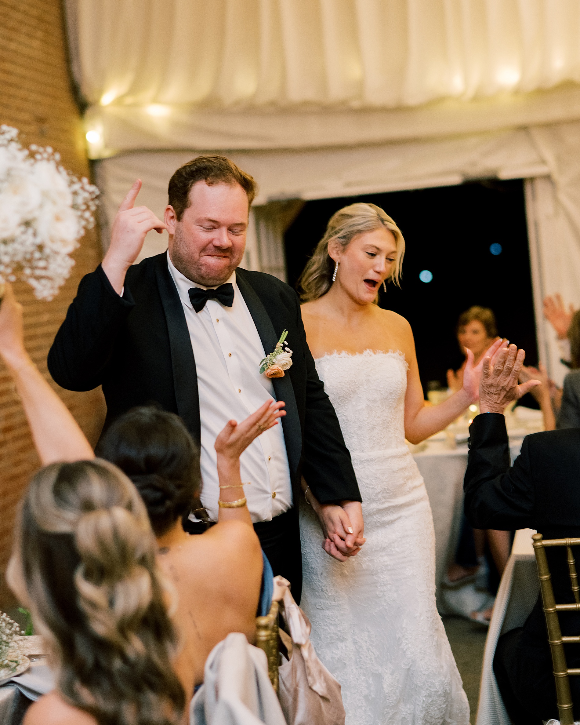 bride and groom enter Classic Wedding at the Evergreen Library in Baltimore, MD