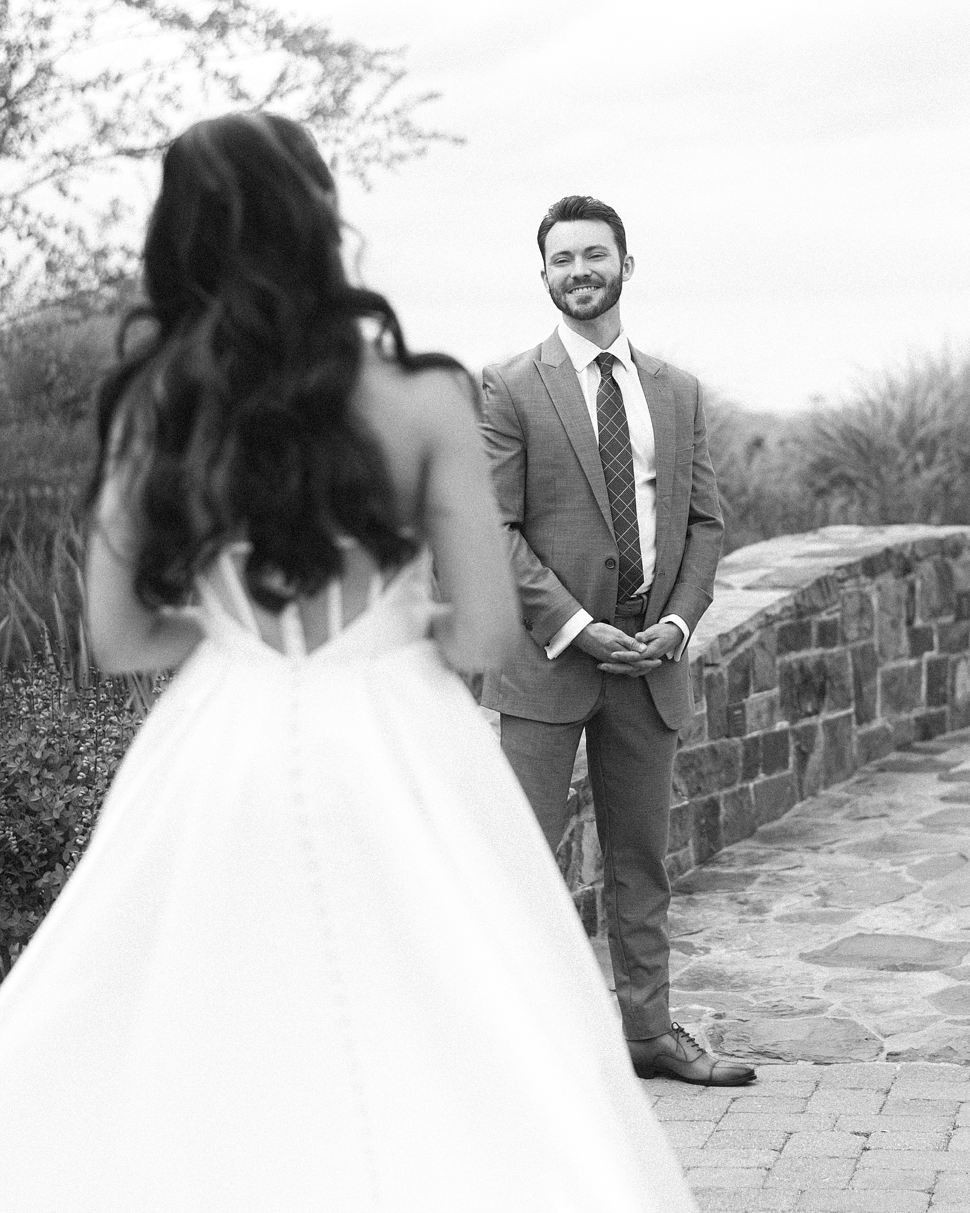 groom turns to see bride during for first look 