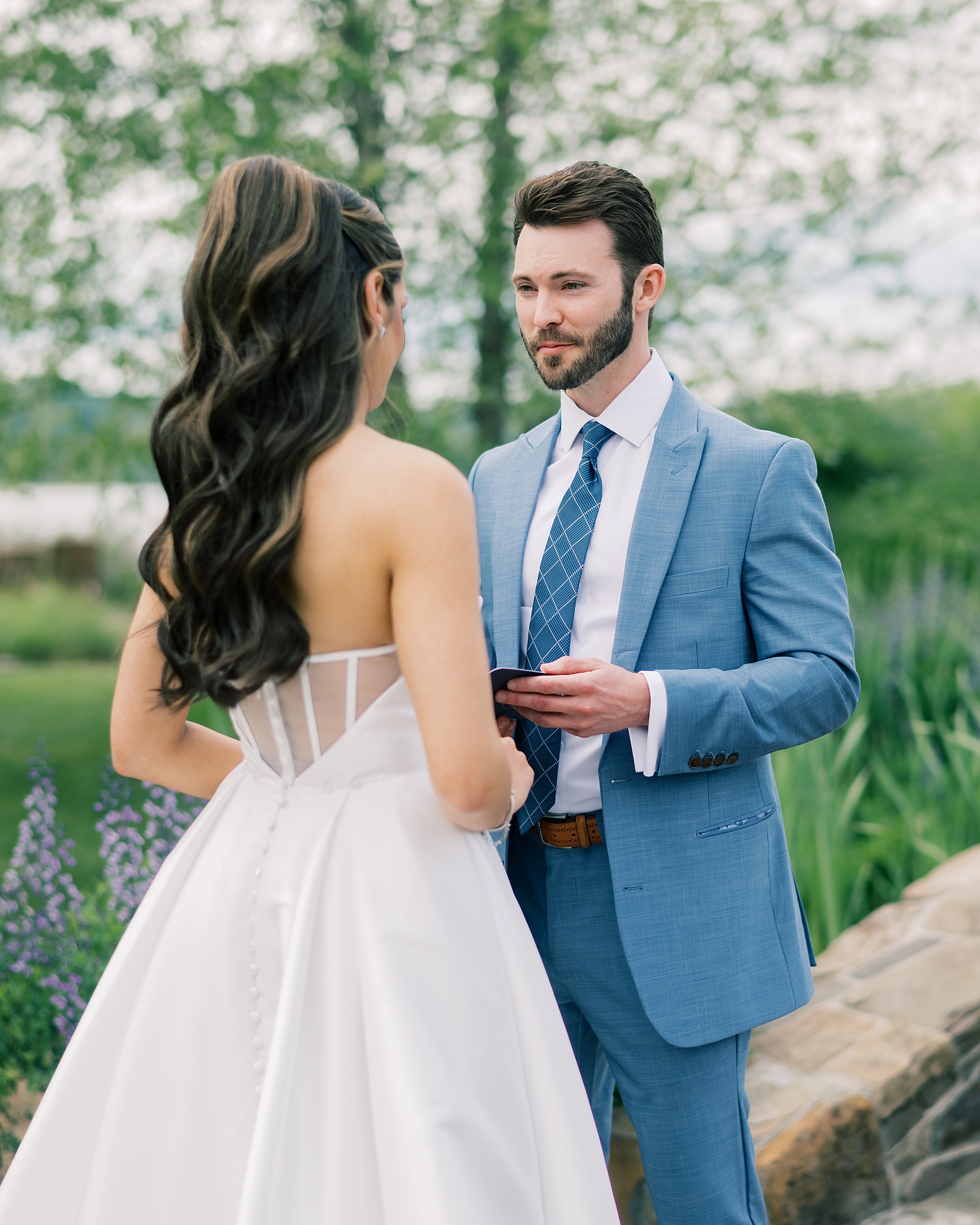 groom reads private vows to bride 