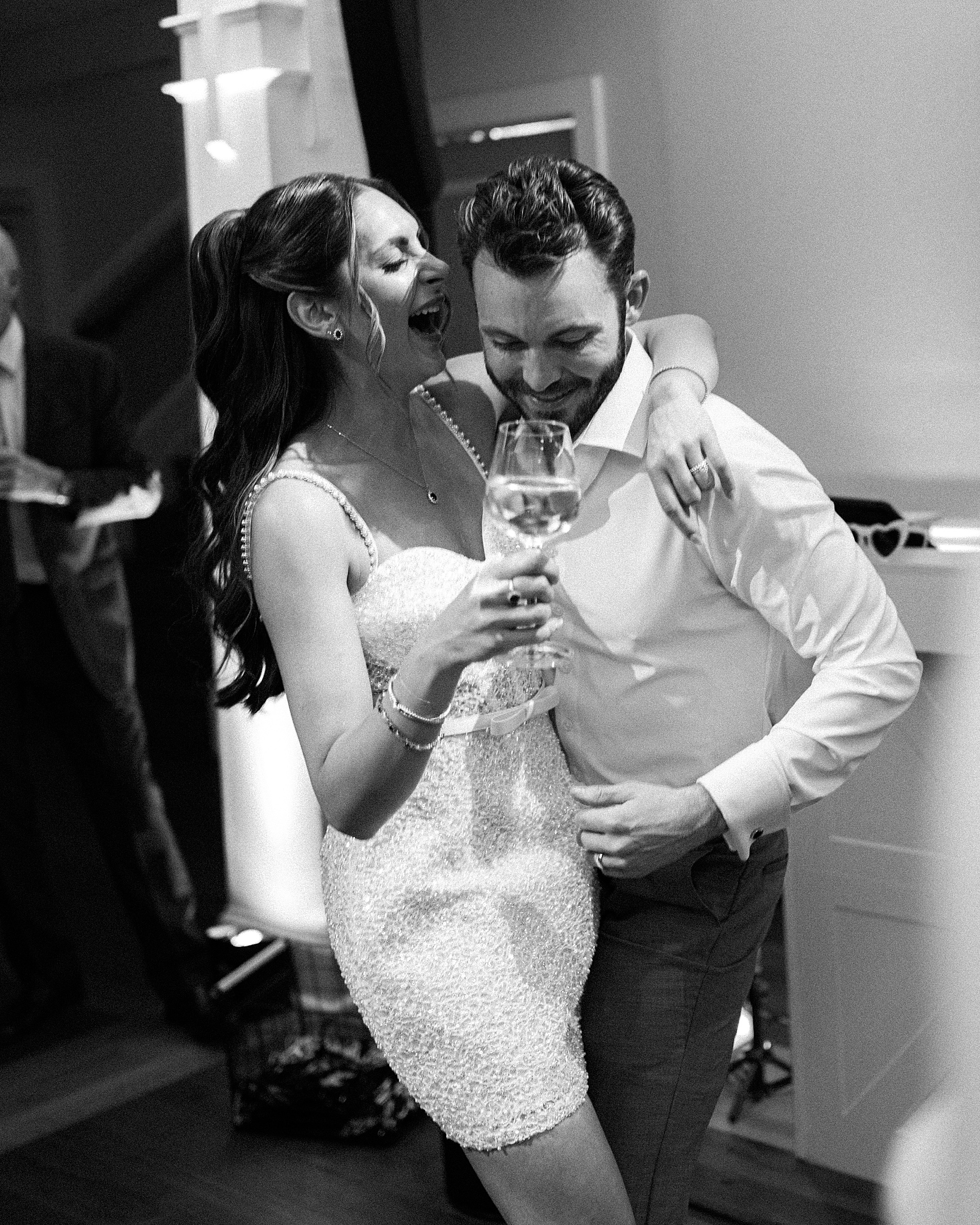 candid wedding photos of newlyweds on dance floor 