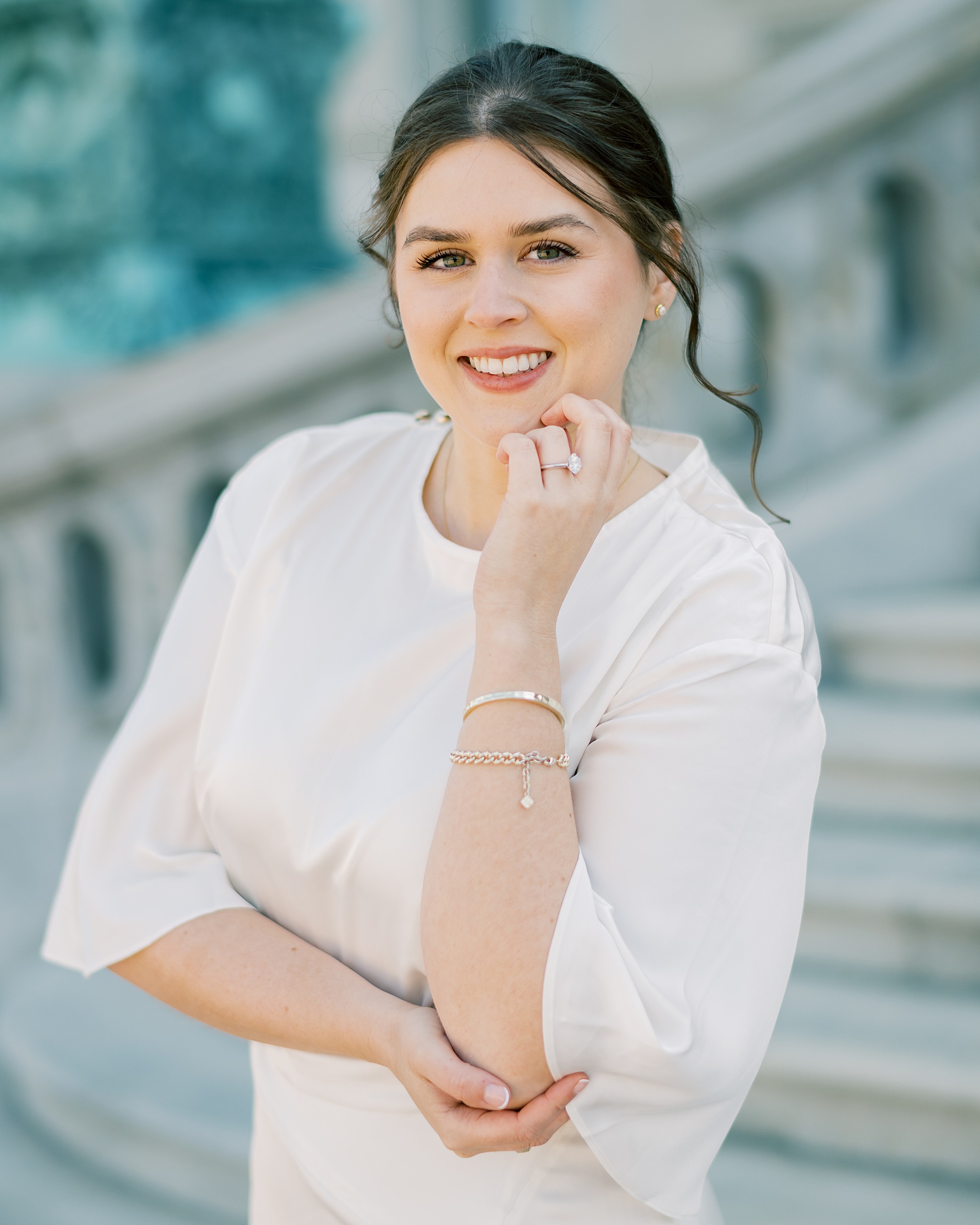 woman in white satin dress for engagement photos 