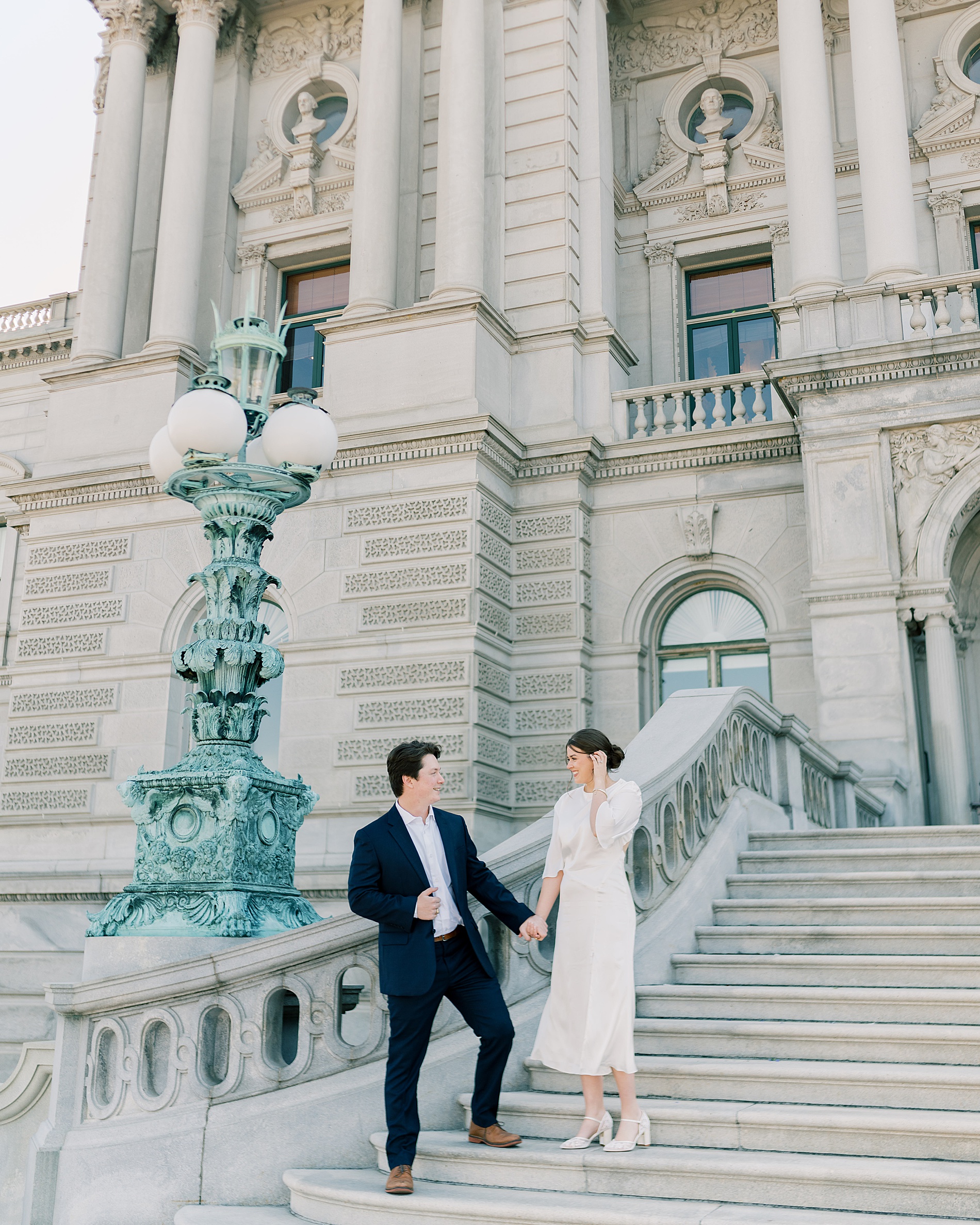 romantic Capitol Hill engagement photo outside the Library of Congress